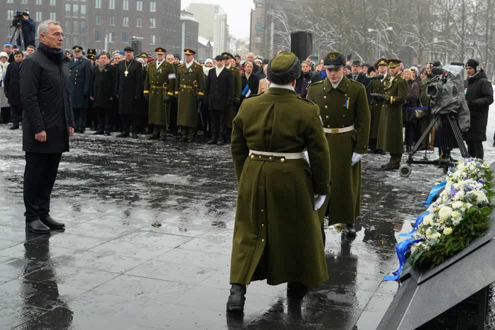 Nato Secretary General Jens Stoltenberg attends a wreath-laying ceremony at the Monument to the War of Independence, on Freedom Square in Tallinn, Estonia, Friday, February 24, 2023 (Sergei Grits/AP/PA)