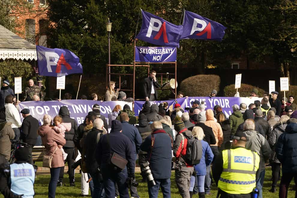 Members of nationalist group Patriotic Alternative protest in Tower Gardens in Skegness, Lincolnshire near to the County Hotel used to house asylum seekers (PA)