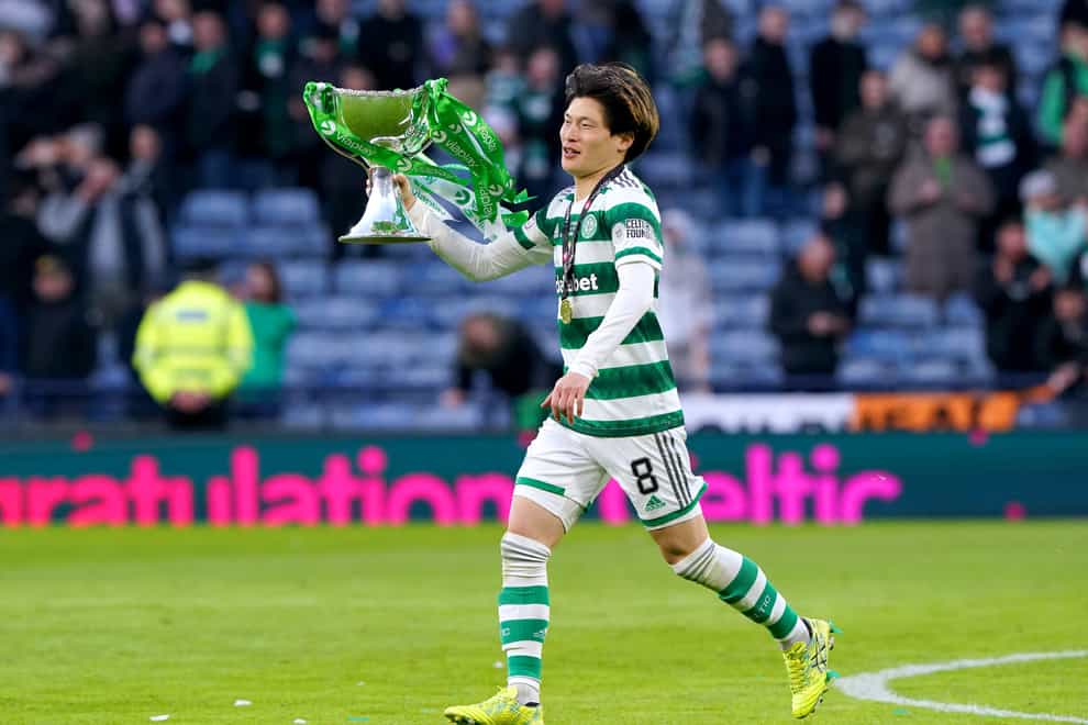 Celtic’s Kyogo Furuhashi celebrates with the Viaplay Cup (Andrew Milligan/PA)