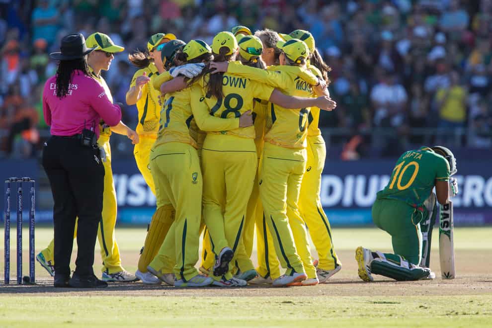 Australia players celebrate beating South Africa (Halden Krog/AP)