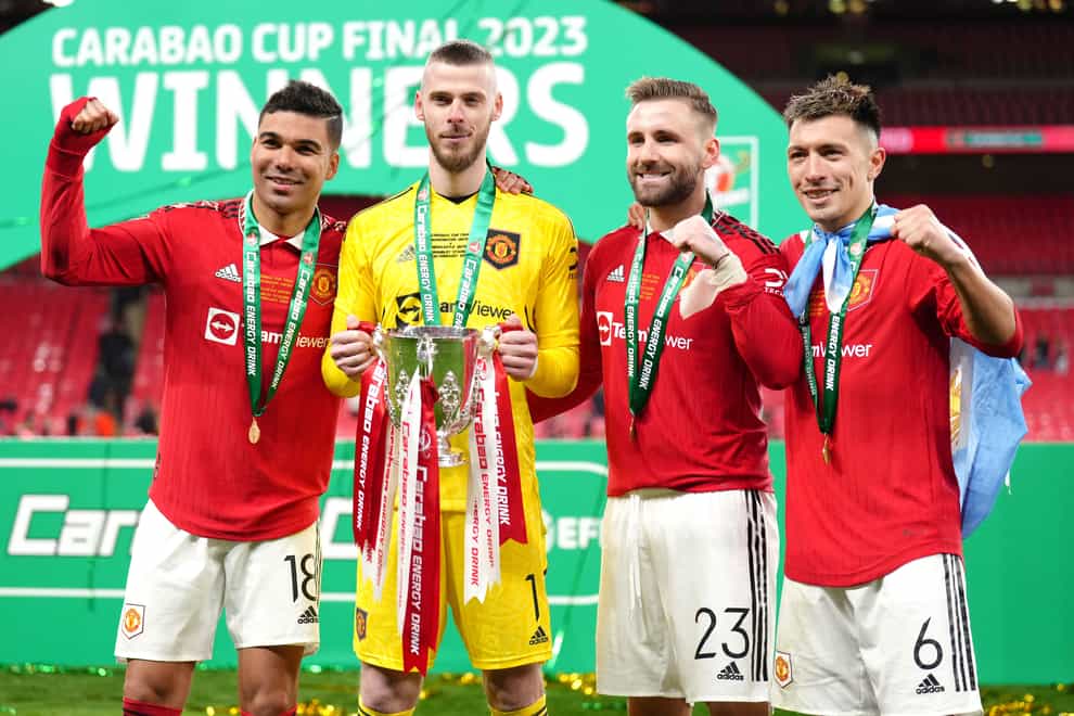 Luke Shaw (second right) celebrates Manchester United’s Carabao Cup triumph (John Walton/PA)