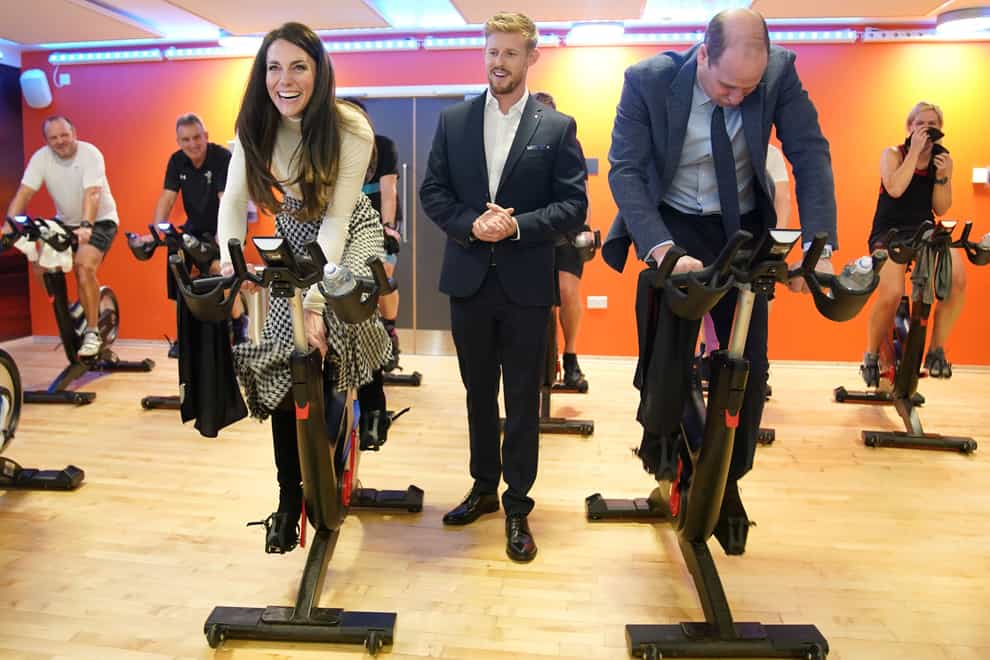 Kate and William in a group cycle class (PA)