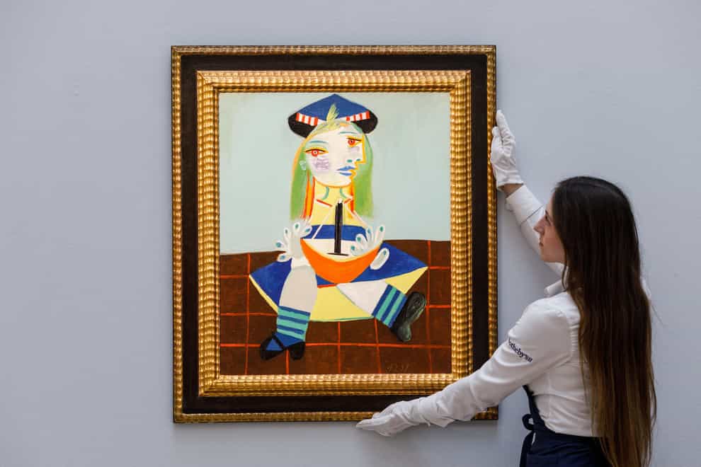 A portrait by Pablo Picasso of his daughter Maya has sold for more than £18 million at auction (Tristan Fewings/Getty Images for Sotheby’s/PA)