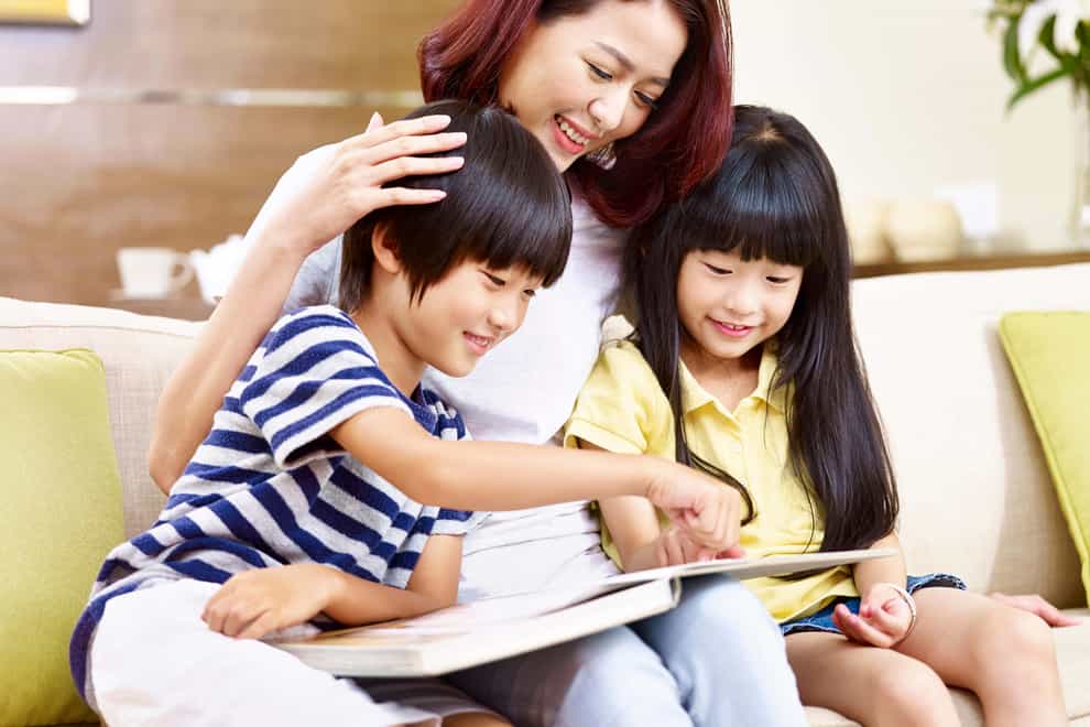 Reading together as a family will make the experience a pleasure (Alamy/PA)