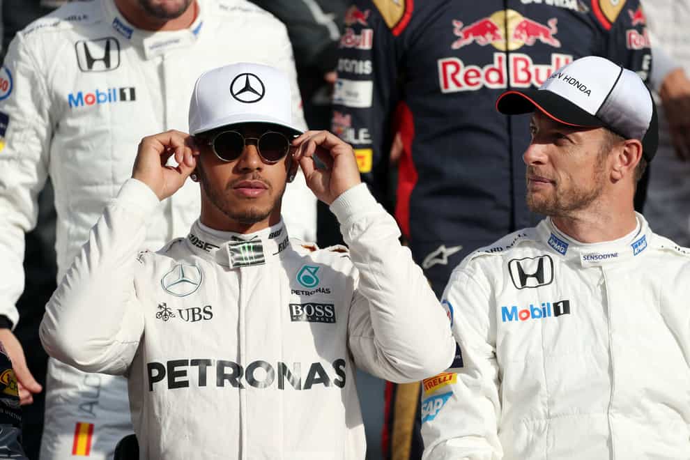 Lewis Hamilton, left, has responded to comments by Jenson Button, right, and Damon Hill (David Davies/PA)