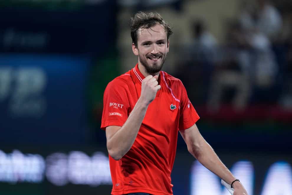 Daniil Medvedev celebrates victory over Novak Djokovic (Kamran Jebreili/AP)