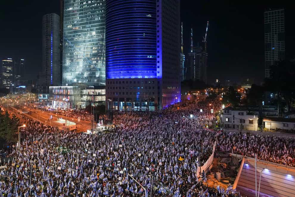 Tens of thousands of Israelis protested in Tel Aviv (Tsafrir Abayov/AP)
