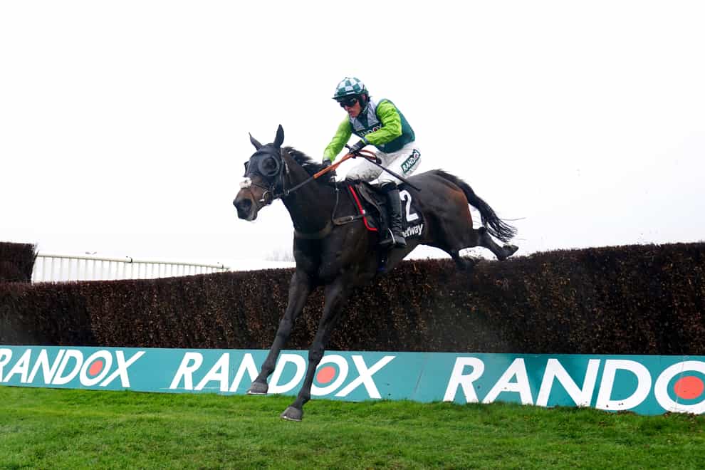 Clan Des Obeaux ridden by jockey Harry Cobden on their way to winning the Betway Bowl Chase at Aintree Racecourse, Liverpool. Picture date: Thursday April 7, 2022. (David Davies/PA)
