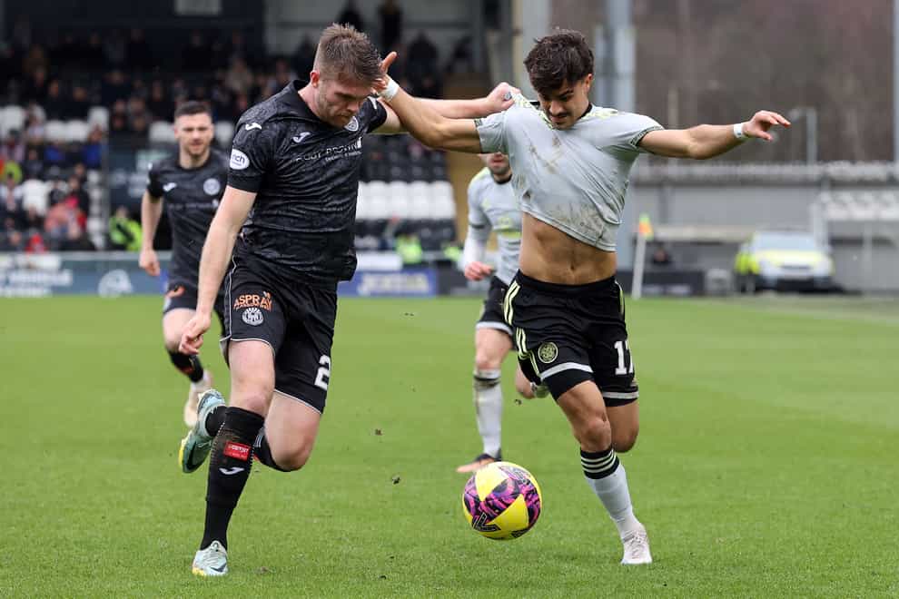 St Mirren’s Marcus Fraser pulls on the shirt of Celtic’s Jota as they battle for the ball during the cinch Premiership match at The SMiSA Stadium, Paisley, Scotland. Picture date: Sunday March 5, 2023.