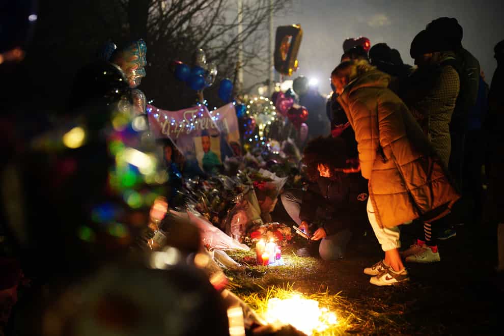 A vigil was under way on Tuesday evening (Ben Birchall/PA)