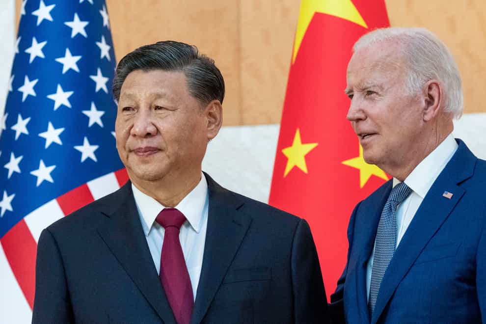 USPresident Joe Biden, right, stands with Chinese President Xi Jinping before a meeting on the sidelines of the G20 summit meeting )Alex Brandon/AP)