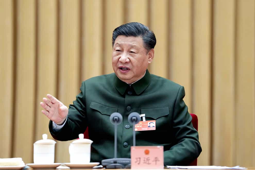 Chinese President Xi Jinping attends a plenary meeting of the delegation of the People’s Liberation Army and People’s Armed Police Force (Li Gang/Xinhua/AP)
