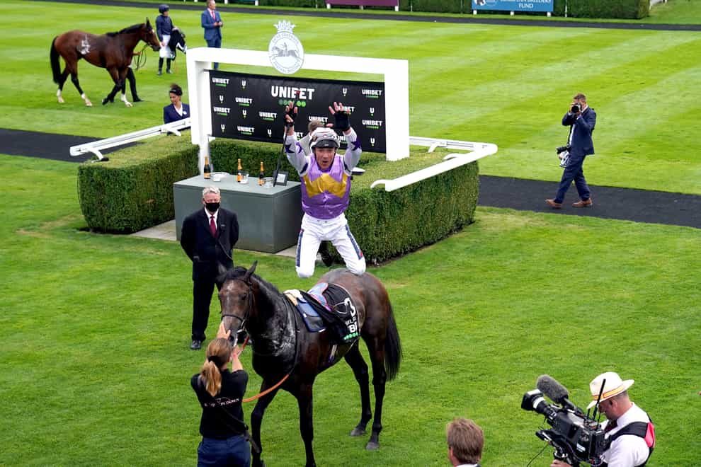 Frankie Dettori leaps from Angel Bleu after victory in the Vintage Stakes at Goodwood and the four-year-old is in action at Wolverhampton on Saturday (John Walton/PA)