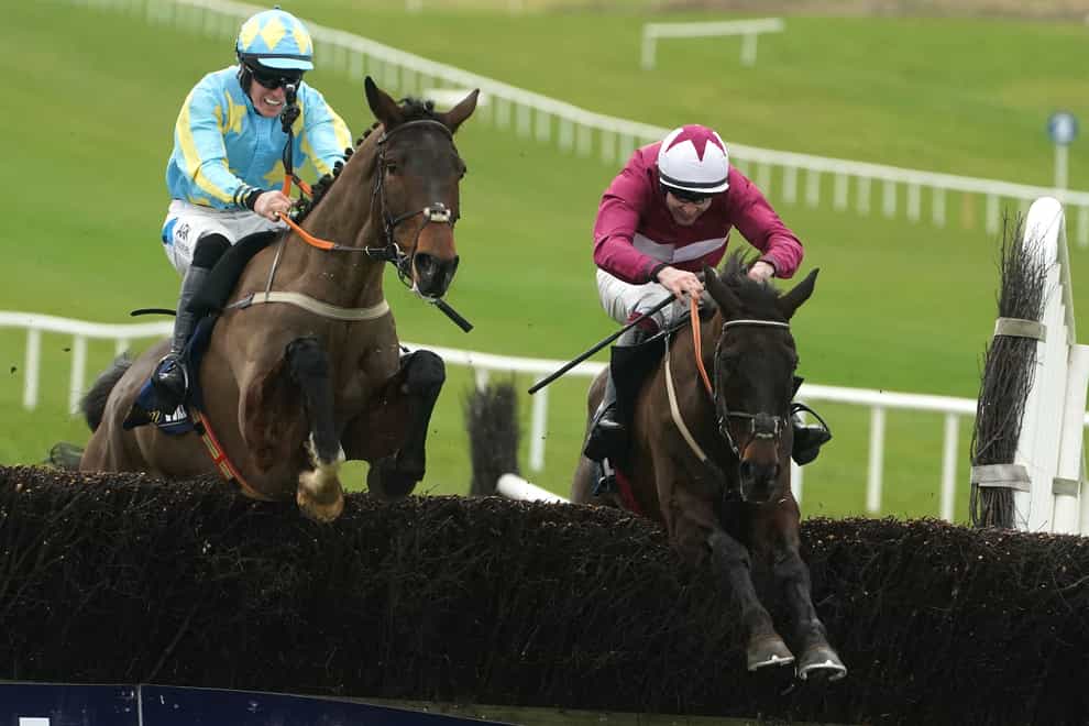 Churchstonewarrior ridden by Aidan Coleman (right) goes on to win The William Hill Ten Up Novice Chase during William Hill Boyne Hurdle Day at Navan Racecourse. Picture date: Sunday February 12, 2023. (Brian Lawless/PA)