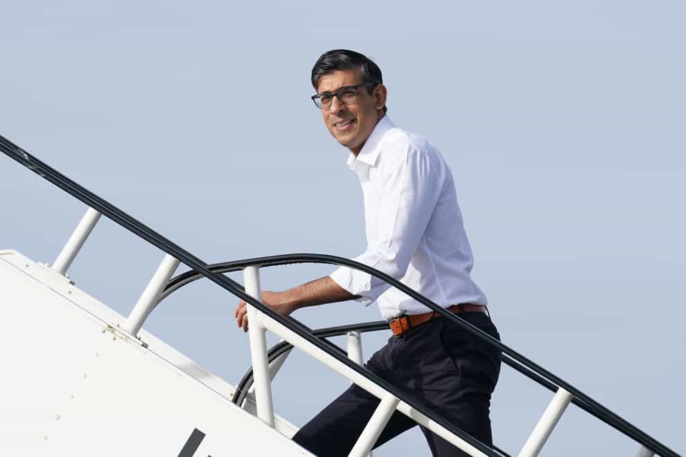 Prime Minister Rishi Sunak boards a plane at Stansted Airport for his flight to San Diego (Stefan Rousseau/PA)