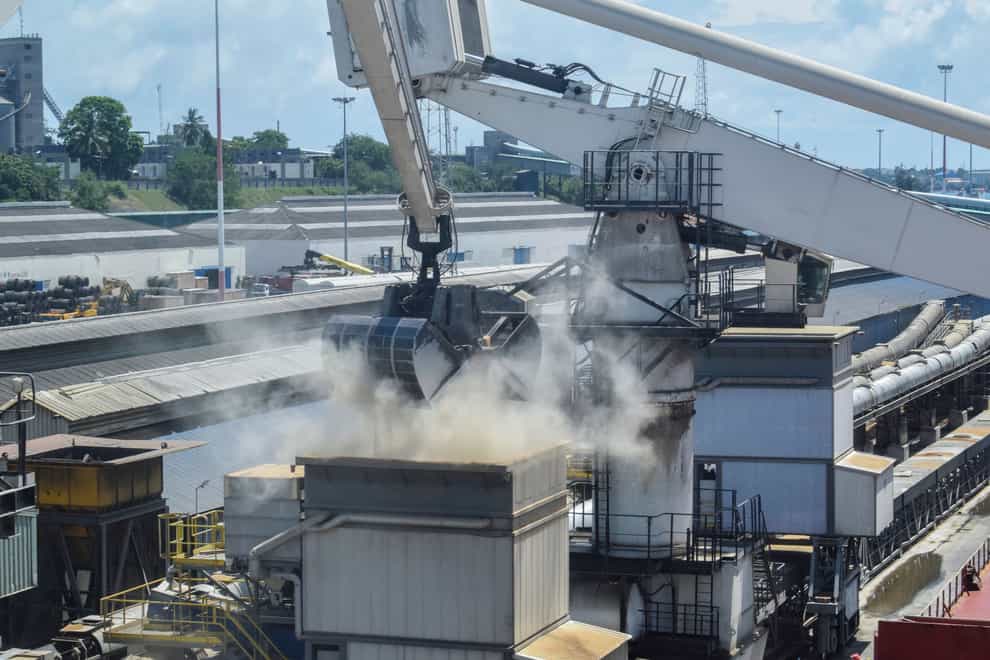 Grain is offloaded from the Eaubonne bulk carrier ship after it docked in the port of Mombasa, Kenya, last November (AP)