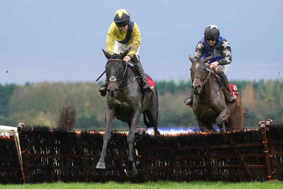 Marine Nationale ridden by jockey Michael O’Sullivan (left) on their way to winning the Bar One Racing Royal Bond Novice Hurdle on day two of the Winter Festival at Fairyhouse Racecourse, County Meath. Picture date: Sunday December 4, 2022. (Brian lawless/PA)