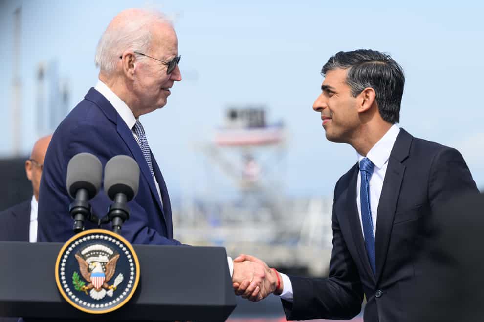Prime Minister Rishi Sunak (right) shakes hands with US President Joe Biden during a press conference during which a visit to Ireland was announced (Leon Neal/PA)