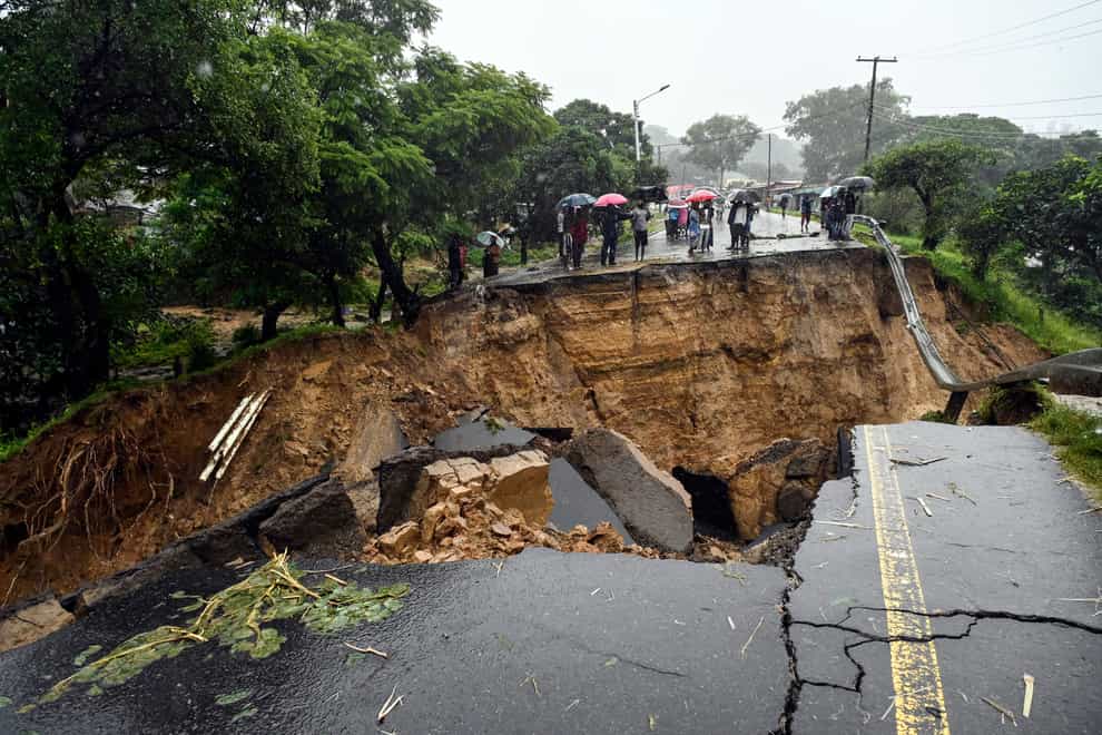 A road connecting the two cities of Blantyre and Lilongwe is seen damaged following heavy rains caused by Tropical Cyclone Freddy in Blantyre, Malawi (Thoko Chikondi/AP)