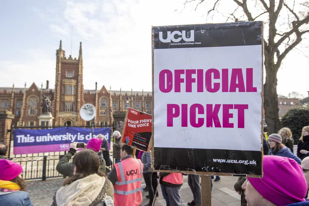 University and College Union workers and supporters on a picket line at Queens University Belfast (Liam McBurney/PA)