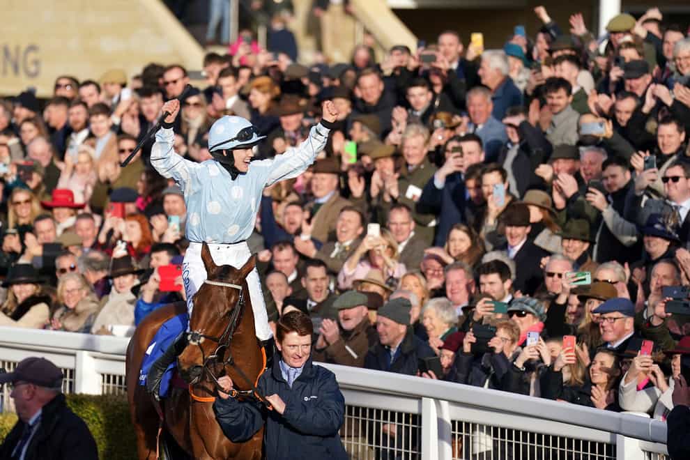 Jockey Rachael Blackmore celebrates after winning the Close Brothers Mares’ Hurdle with Honeysuckle on day one of the Cheltenham Festival at Cheltenham Racecourse. Picture date: Tuesday March 14, 2023. (Tim Goode/PA)