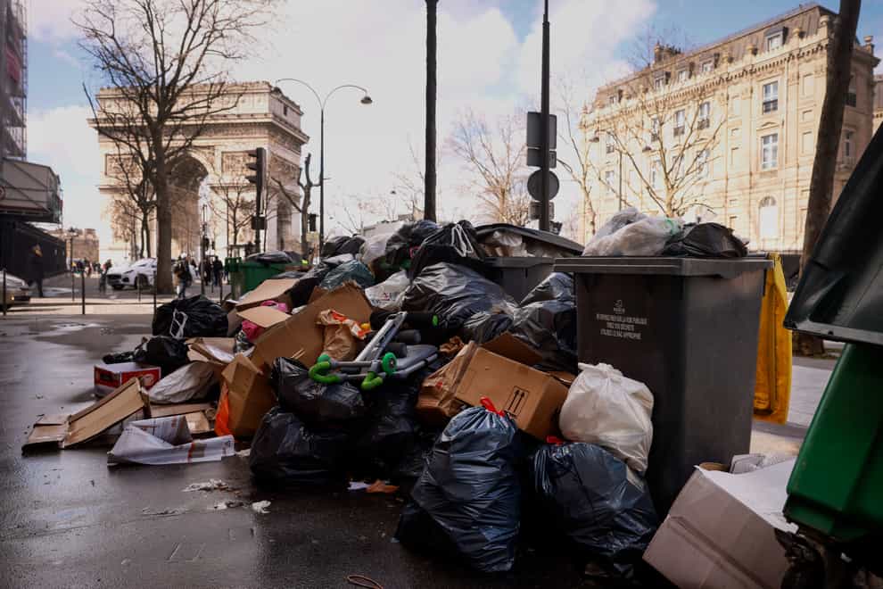 Uncollected rubbish near the Arc de Triomphe in Paris (Thomas Padilla/AP)