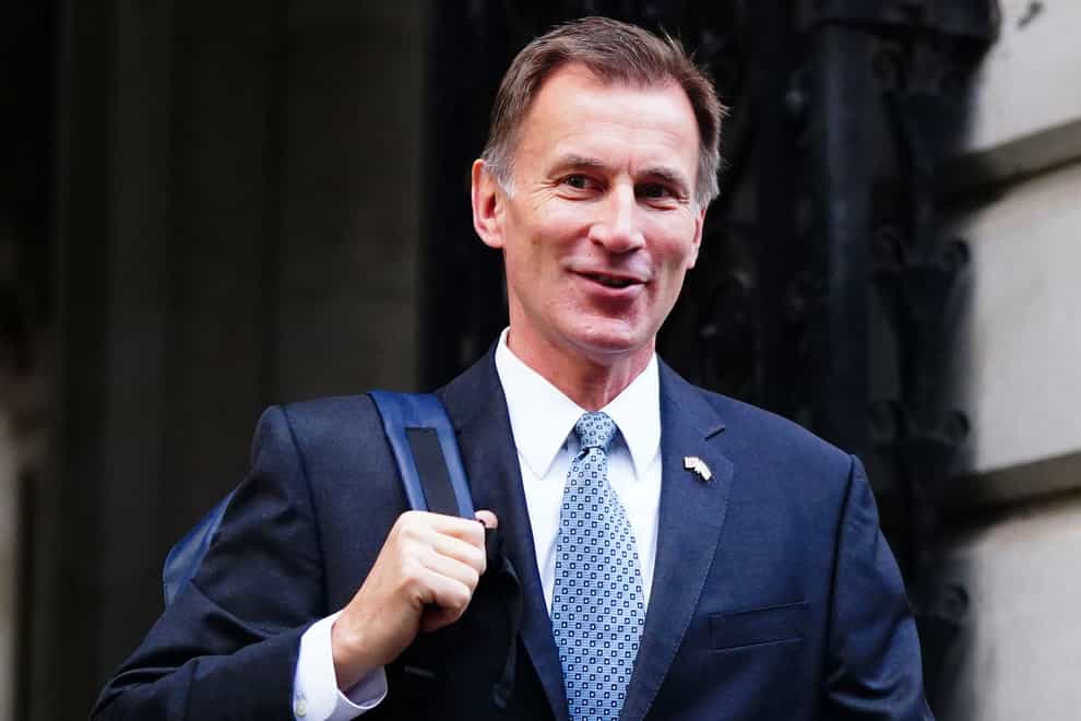 A major expansion of free childcare and an extension in support for household energy costs will help ease the cost of living as Jeremy Hunt sets out a ‘Budget for growth’ (Victoria Jones/:PA)