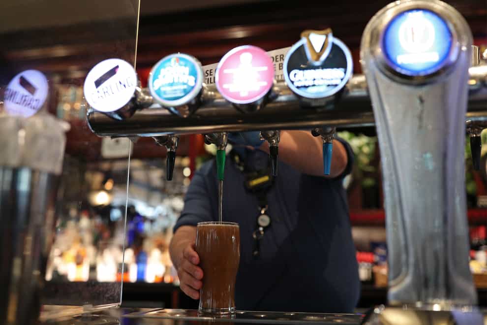 The duty charged on draught pints is to be frozen to help “the great British pub”, Jeremy Hunt has announced (Yui Mok/PA)
