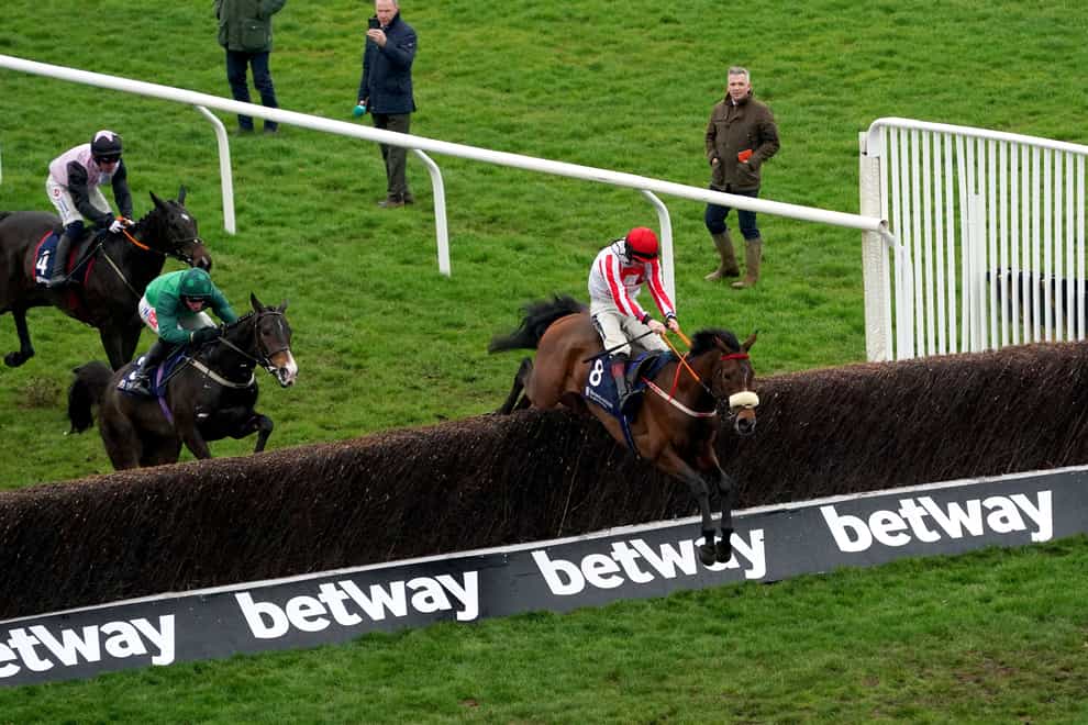 The Real Whacker ridden by jockey Sam Twiston-Davies on their way to winning the Brown Advisory Novices’ Chase on day two of the Cheltenham Festival at Cheltenham Racecourse. Picture date: Wednesday March 15, 2023.