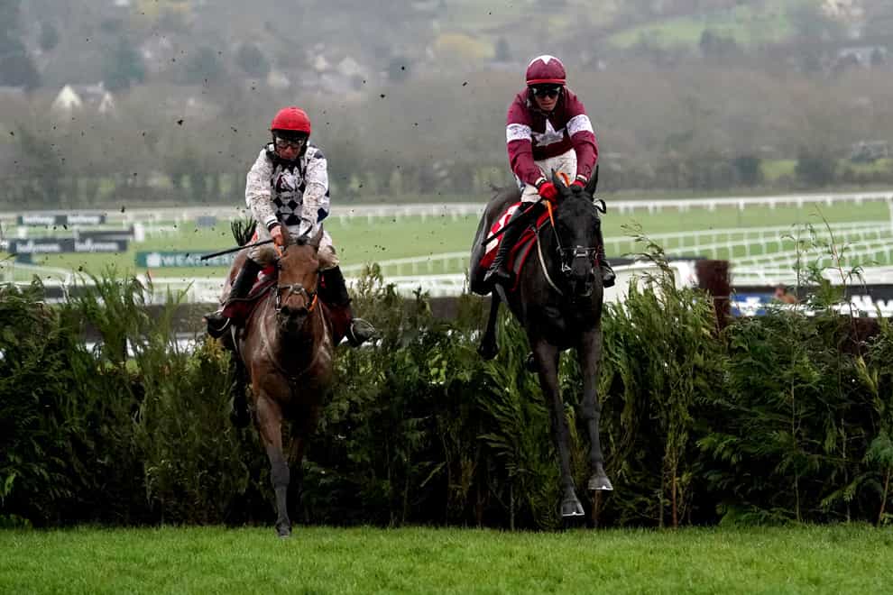 Delta Work ridden by jockey Keith Donoghue (right) on their way to winning the Glenfarclas Chase on day two of the Cheltenham Festival at Cheltenham Racecourse. Picture date: Wednesday March 15, 2023.