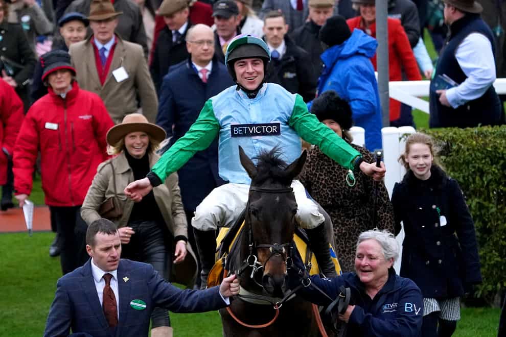 Jockey Gavin Sheehan celebrates on You Wear It Well as they’re led into the winners enclosure after winning the Jack De Bromhead Mares’ Novices’ Hurdle on day three of the Cheltenham Festival at Cheltenham Racecourse. Picture date: Thursday March 16, 2023.
