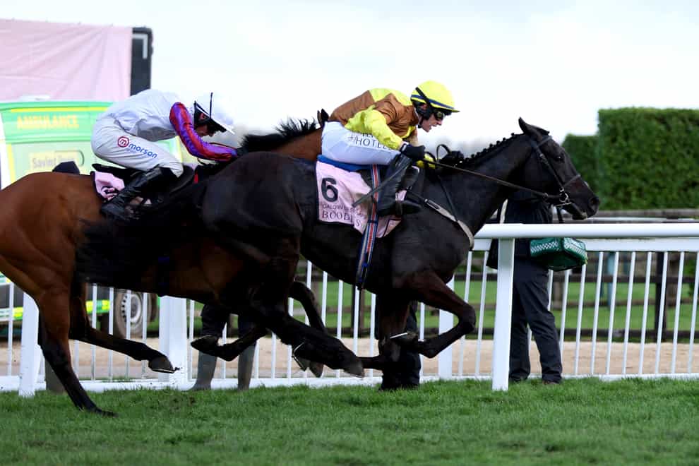 Galopin Des Champs ridden by jockey Paul Townend (right) on their way to winning the Boodles Cheltenham Gold Cup Chase on day four of the Cheltenham Festival at Cheltenham Racecourse. Picture date: Friday March 17, 2023.