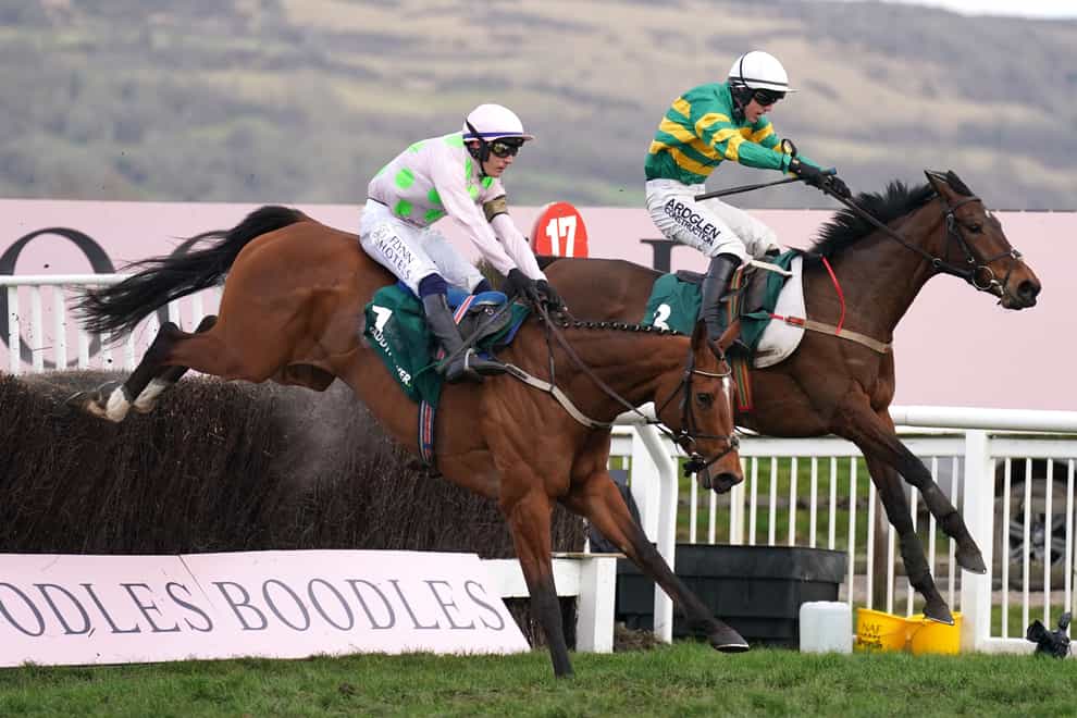 Impervious ridden by Brian hughes (right) goes on to win The Mrs Paddy Power Mares� Chase on day four of the Cheltenham Festival at Cheltenham Racecourse. Picture date: Friday March 17, 2023.