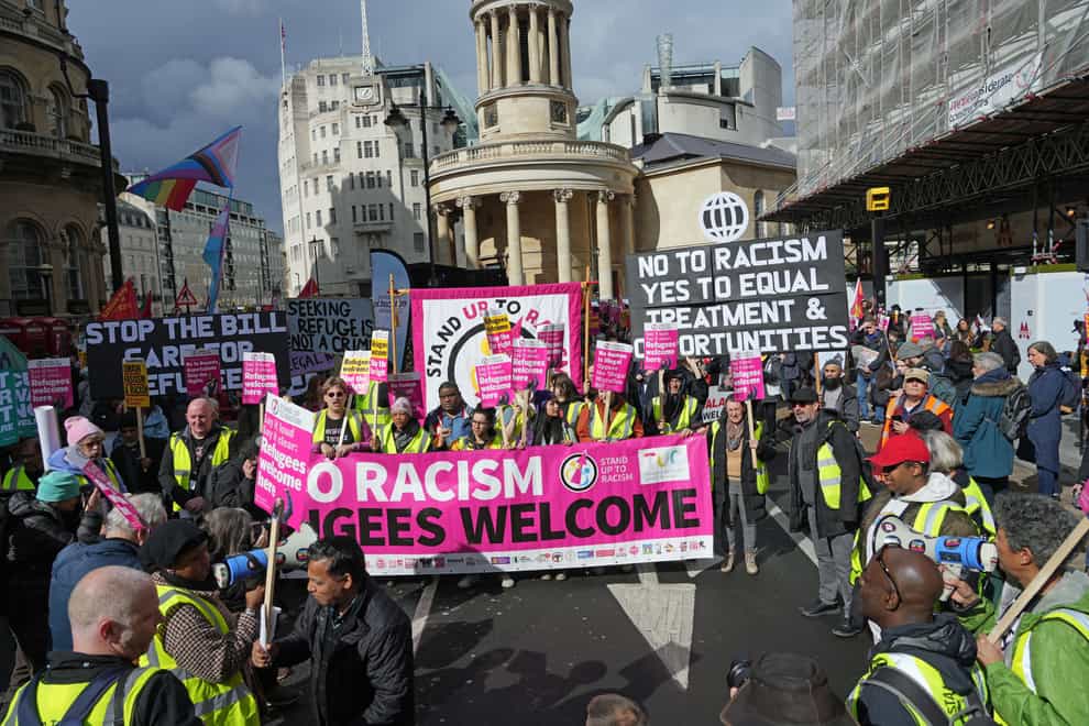 People march towards Downing Street in London to demonstrate against racism, Islamophobia, antisemitism, fascism and the far right (Jeff Moore/PA)