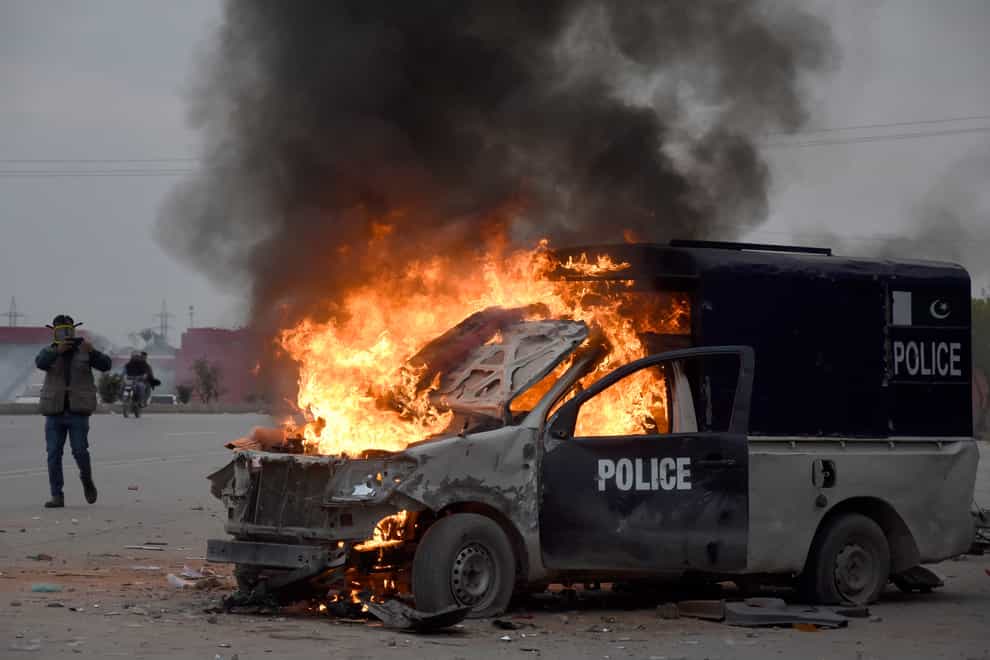There were violent clashes between police and supporters of former prime minister Imran Khan (AP Photo/W.K. Yousafzai)