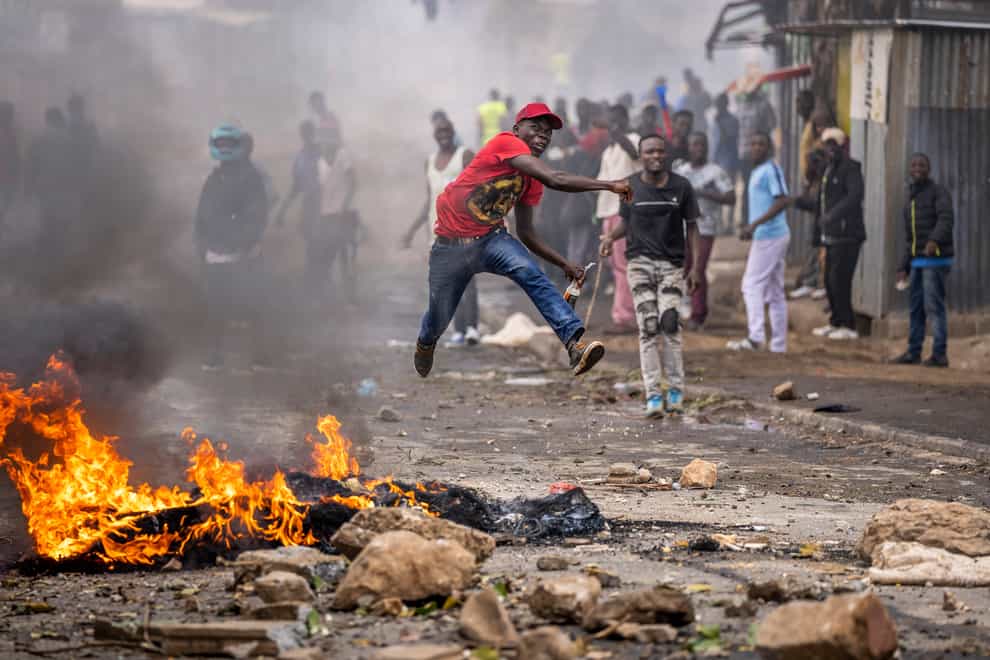 Hundreds of opposition supporters have taken to the streets of the Kenyan capital over the result of the last election and the rising cost of living (Ben Curtis/AP)