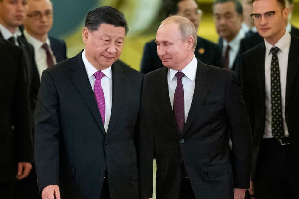 Xi Jinping (left) and Vladimir Putin are meeting in Moscow(Alexander Zemlianichenko/Pool/AP/PA)