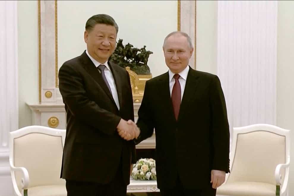 Russian President Vladimir Putin has welcomed Chinese leader Xi Jinping to the Kremlin (Russian Pool/AP)
