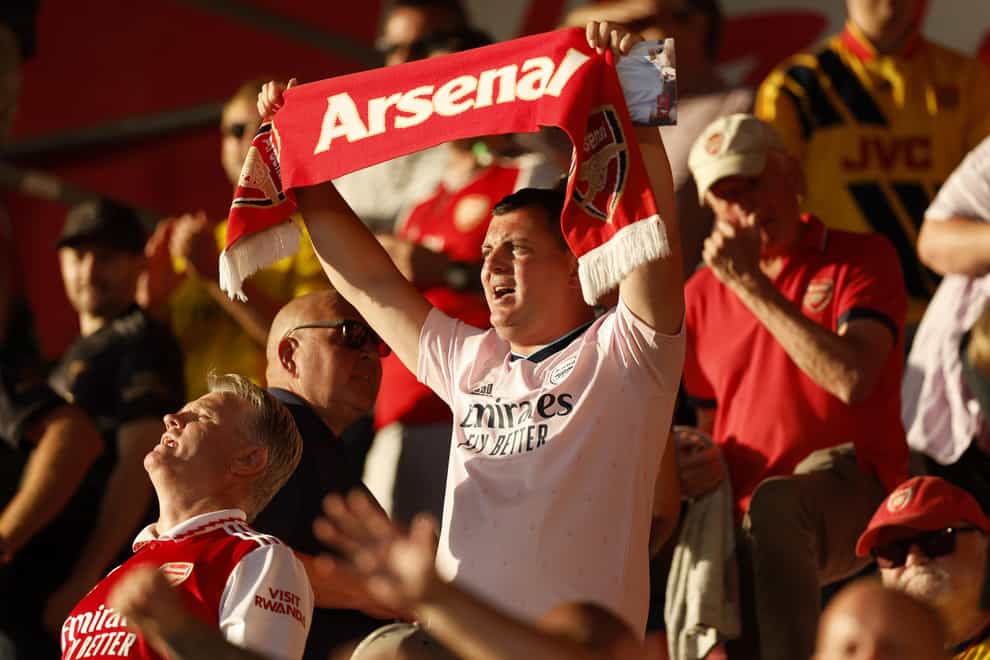 Arsenal fans are dreaming of a first Premier League title in 19 years (Steven Paston/PA)