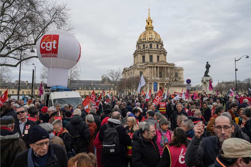 People protest against the retirement bill in Paris on Monday (Lewis Joly/AP)