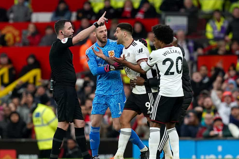 Fulham’s Aleksandar Mitrovic (second right) has been charged with violent conduct after being sent off by referee Chris Kavanagh (PA)