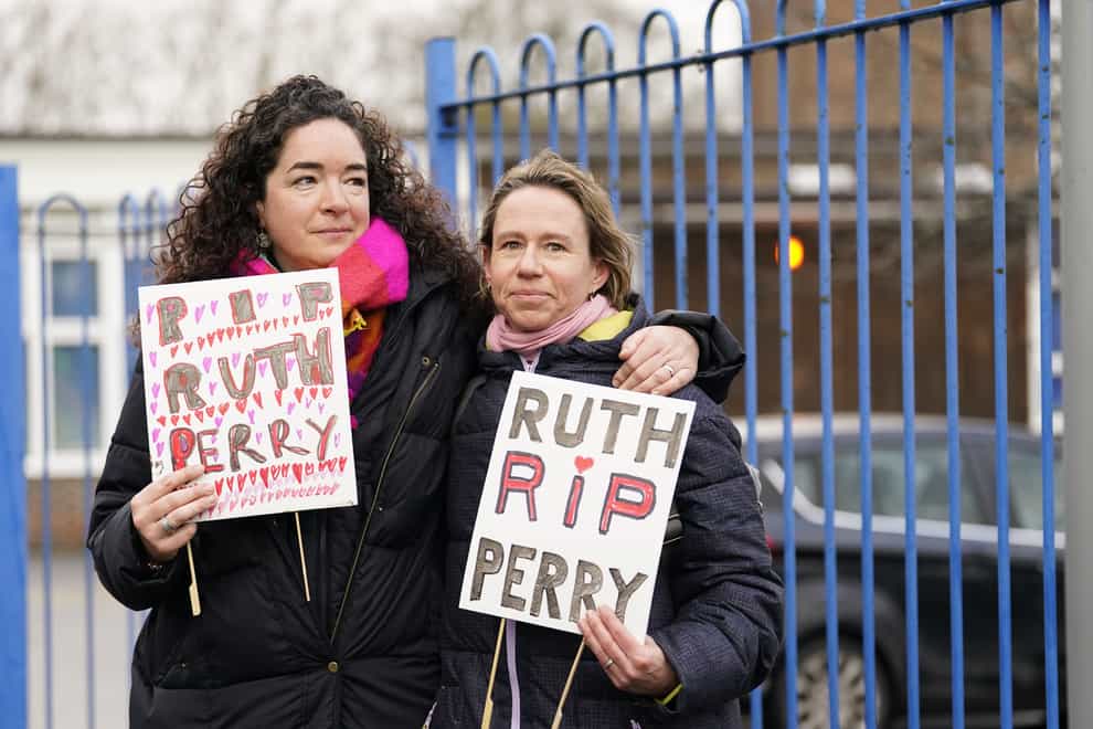 Ellen, left, and Liz outside the gates to John Rankin Schools in Newbury, Berkshire (Andrew Matthews/PA)