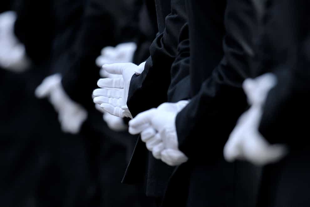Stock photo of Metropolitan Police officers wearing white dress uniform gloves (Nick Ansell/PA)