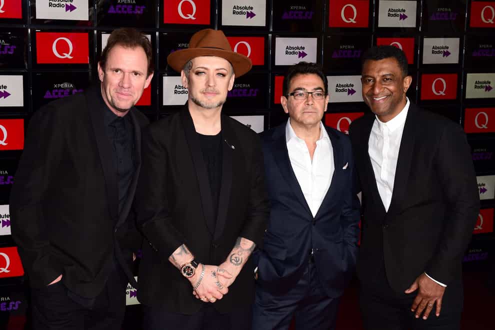 Culture Club members pictured in 2014, from left to right, Roy Hay, Boy George, Jon Moss and Mikey Craig (Ian West/PA)