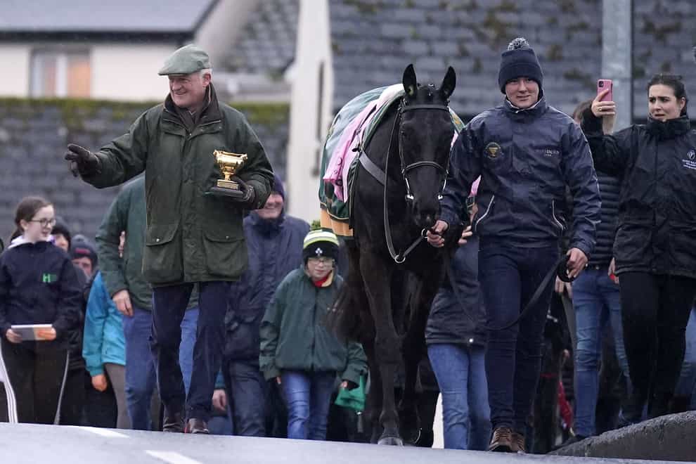 Galopin Des Champs along with trainer Willie Mullins during the homecoming parade through the village of Leighlinbridge in County Carlow, Ireland.