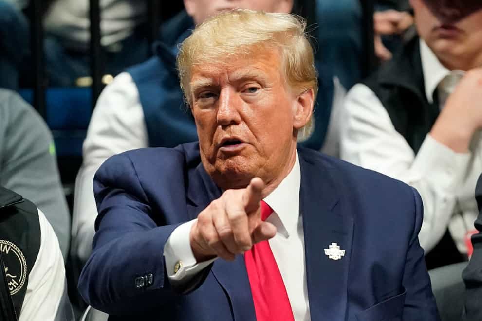 Former president Donald Trump could be indicted by a Manhattan grand jury as soon as this week, potentially charged with falsifying business records connected to hush money payments during his 2016 campaign to women who accused him of sexual encounters (Sue Ogrocki/AP)