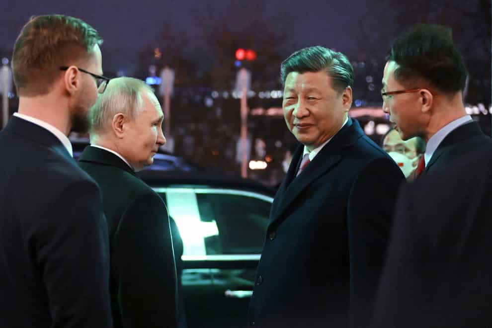 Chinese leader Xi Jinping has left Moscow, wrapping up a three-day visit, shortly after Japanese PM Fumio Kishida left Kyiv (Grigory Sysoyev, Sputnik, Kremlin Pool Photo/AP)