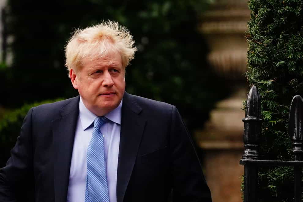 Former prime minister Boris Johnson leaves his home in London before giving evidence as to whether he knowingly misled Parliament over partygate at a hearing of the Commons Privileges Committee (Victoria Jones/PA)