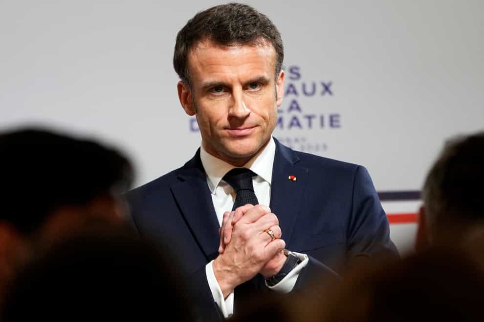 French president Emmanuel Macron has repeatedly said the retirement system needs to be modified to keep it financed (Michel Euler/AP)