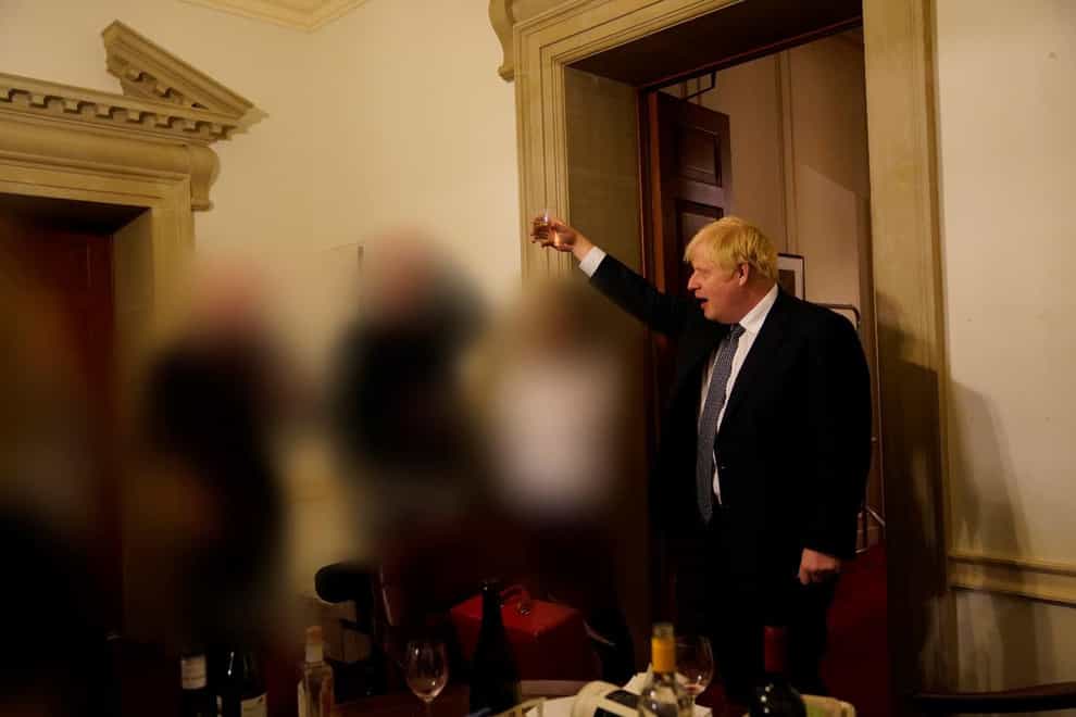 Boris Johnson at a gathering in 10 Downing Street for the departure of a special adviser, which was released with the publication of Sue’s Gray report (Sue Gray Report/Cabinet Office/PA)